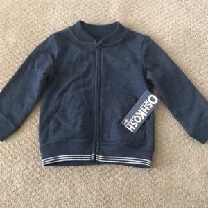 Toddler snap up OshKosh B’Gosh. Brand new with tags